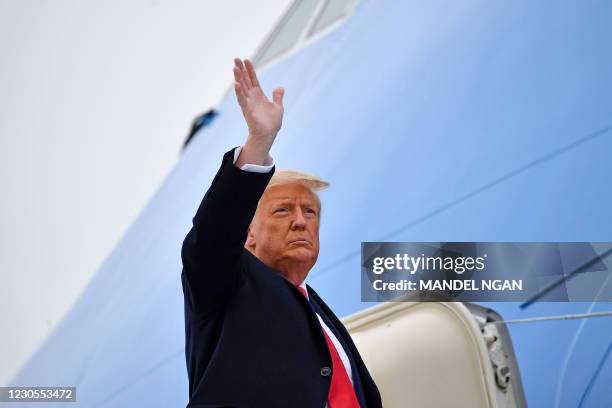 President Donald Trump boards Air Force One before departing Harlingen, Texas on January 12, 2021.