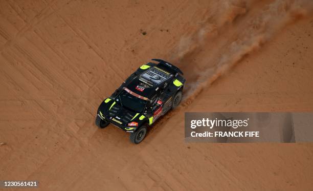 Driver Brian Baragwanath and co-driver Taye Perry of South Africa compete during the Stage 10 of the Dakar Rally 2021 between Neom and Alula in Saudi...