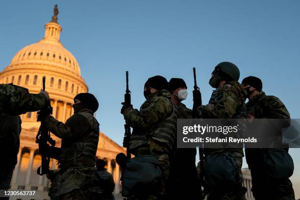 Weapons are distributed to members of the National Guard outside the U.S. Capitol on January 13, 2021 in Washington, DC. Security has been increased...