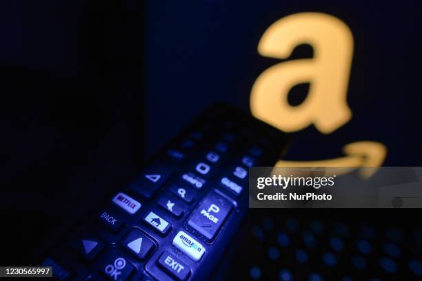 Photo of a person using an Amazon button remote while browsing Amazon.com site, in an apartment during the Dublin coronavirus lockdown.According to a...