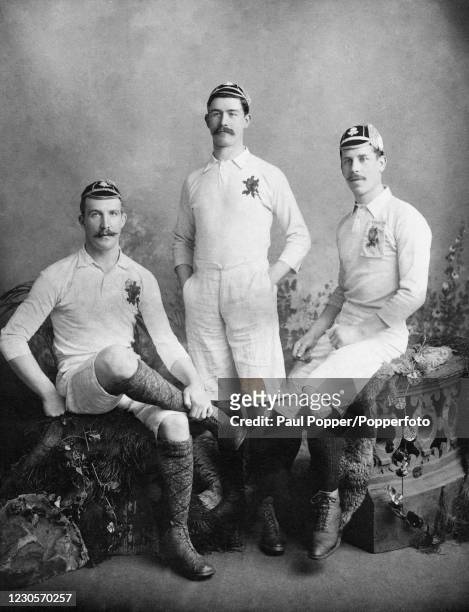 Studio portrait of James Frederick Byrne with his brother Francis and another England rugby teammate, circa 1895. Fred Byrne played for and captained...