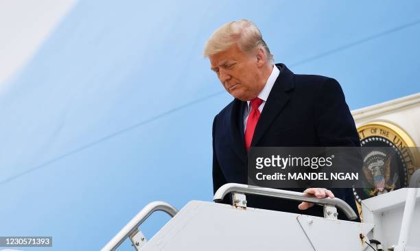 President Donald Trump stepping off Air Force One upon arrival in Harlingen, Texas, on January 12, 2021. - Trump on January 13 became the first US...