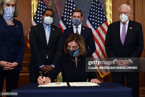 Majority Leader Steny Hoyer and Assistant Speaker Katherine Clark , alongside House Impeachment Managers Representatives Joe Neguse and Eric Swalwell...