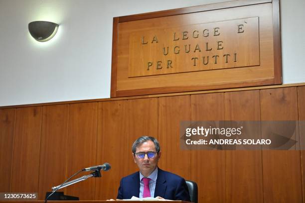 Judge Roberto Di Bella checks documents during an interview in the courtroom of the Juvenile Court, in Reggio Calabria, Calabria, Italy, July 7,...