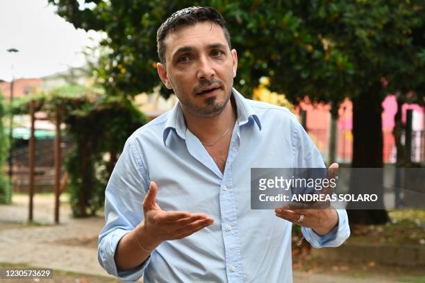 Michele Conia, mayor of the town of Cinquefrondi, gestures as he speaks during an interview at the Villa Comunale of Cinquefrondi in Calabria region...