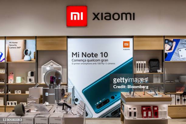 Xiaomi Corp. Smartphones and tech products on display inside the AliExpress plaza retail store, operated by Alibaba Group Holding Ltd., in Barcelona,...