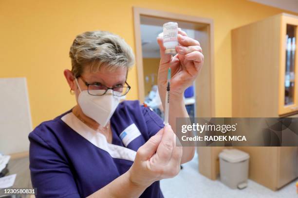 Doctor prepares a Moderna vaccine Covid-19 for an inhabitant of the "Home for the Elderly Kamenec" in Ostrava, Czech Republic, on January 14, 2021. -...