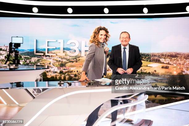 Presenter Jean-Pierre Pernaut is photographed with Marie-Sophie Lacarrau for Paris Match on December 2, 2020 in Boulogne-Billancourt, France.