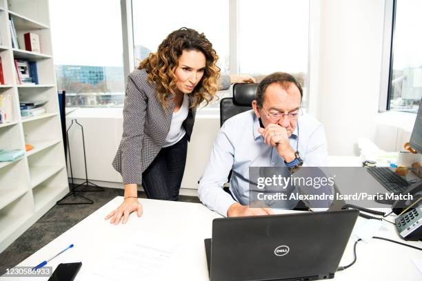 Presenter Jean-Pierre Pernaut is photographed with Marie-Sophie Lacarrau for Paris Match on December 2, 2020 in Boulogne-Billancourt, France.