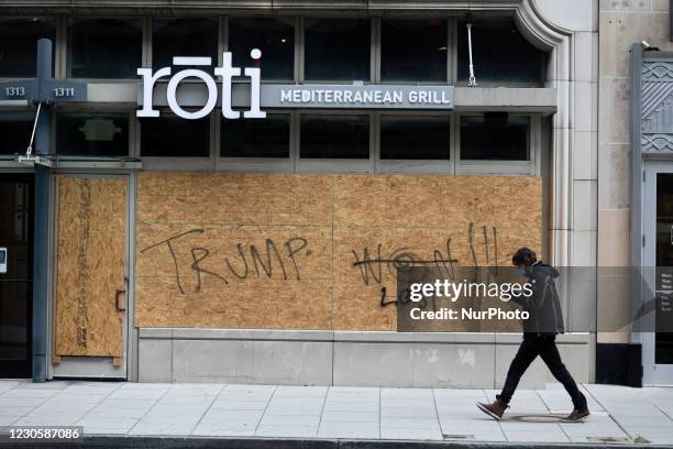 Business storefront is enclosed by protective plywood days before Inauguration Day in Washington, D.C. January 14, 2021.