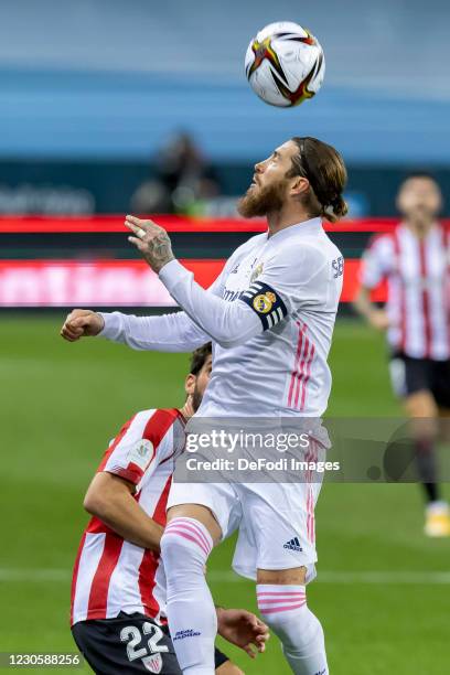 Raul Garcia of Athletic Bilbao and Sergio Ramos of Real Madrid battle for the ball during the Spanish Super Cup - Semi final match between Real...