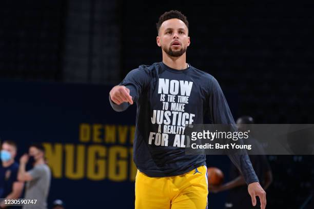 Stephen Curry of the Golden State Warriors warms up prior to a game against the Denver Nuggets on January 14, 2021 at the Ball Arena in Denver,...