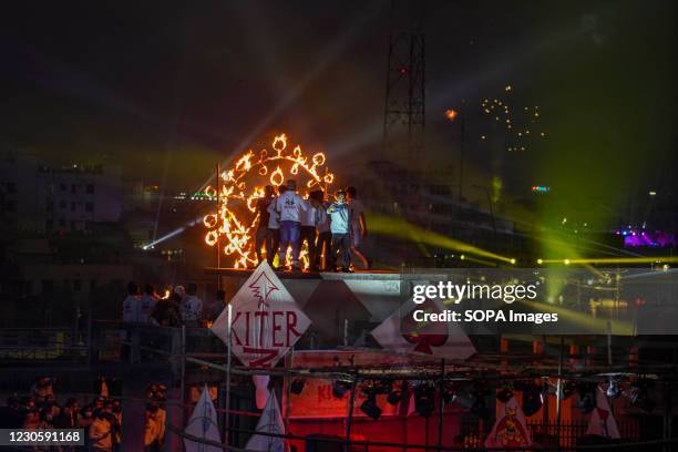 Bangladeshi people set up party lights and perform dance on a rooftop to celebrate Shakrain during Shakrain festival or the Kite festival. Shakrain...