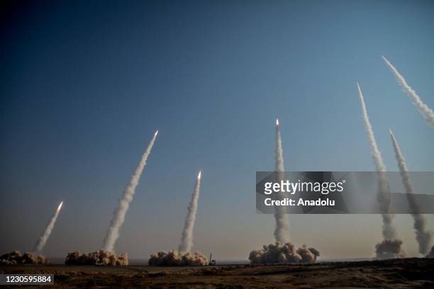 Members of the Islamic Revolutionary Guard Corps conduct a military drill with ballistic missiles and unmanned air vehicles at Great Salt Desert, in...