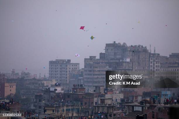 Old Dhaka community people enjoy posh Sankranti with different activities including kite flying in the evening at old Dhaka in Bangladesh. Shakrain...