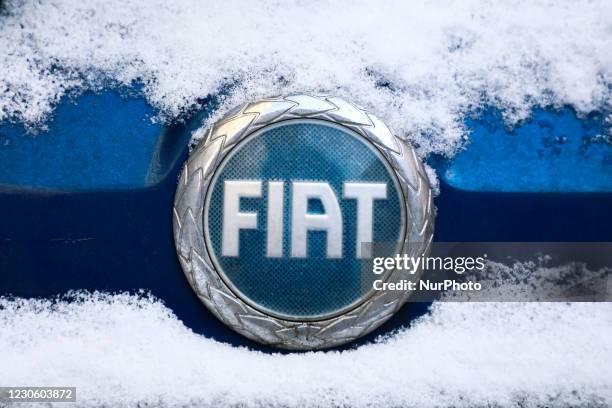Fiat car emblem is covered with snow in Krakow, Poland. January 15, 2021.