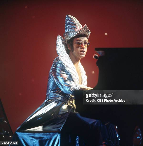 Musician Elton John performs on the CBS television musical variety show "Cher" on February 12 in Los Angeles, California.
