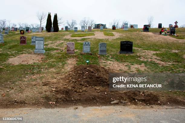 Fresh graves is seen at Woodlawn Cementery in New York on January 15, 2021 as the global coronavirus death toll surpassed 2 million. - The official...