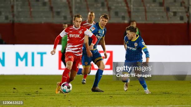 David Kopacz of Wuerzburger Kickers, Lasse Schlueter of Eintracht Braunschweig and Patrick Kammerbauer of Eintracht Braunschweig during the Second...