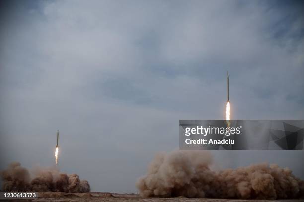 Members of the Islamic Revolutionary Guard Corps test Siccil, Imad and Kadir ballistic missiles during a military drill at Great Salt Desert, in the...