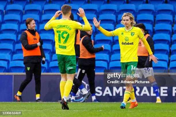 Todd Cantwell of Norwich City celebrates his goal with Jacob Sorensen during the Sky Bet Championship match between Cardiff City and Norwich City at...