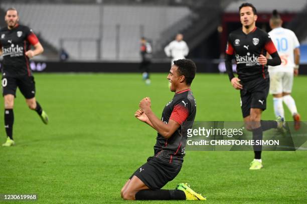 Nimes' Swedish midfielder Niclas Eliasson celebrates his first goal during the French L1 football match between Olympique de Marseille and Nimes...
