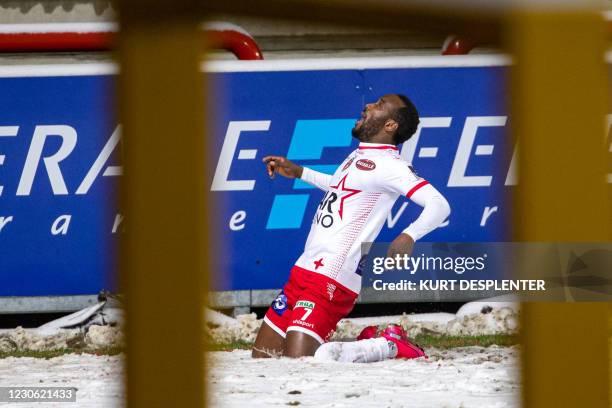 Mouscron's Fabrice Olinga celebrates after scoring during a soccer match between Royal Excel Mouscron and KRC Genk, Saturday 16 January 2021 in...
