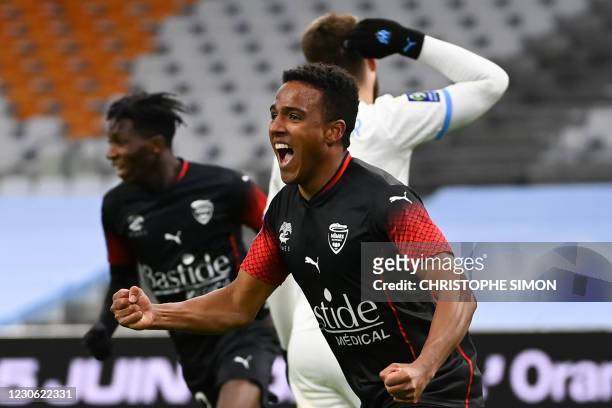 Nimes' Swedish midfielder Niclas Eliasson celebrates his second goal during the French L1 football match between Olympique de Marseille and Nimes...