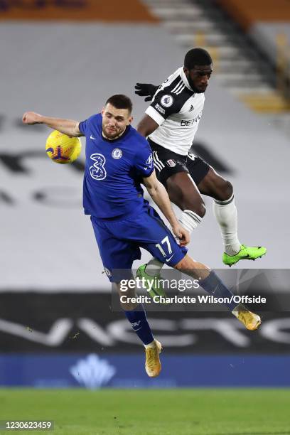 Mateo Kovacic of Chelsea battles with Aboubakar Kamara of Fulham during the Premier League match between Fulham and Chelsea at Craven Cottage on...