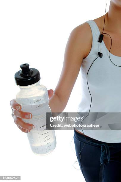 young woman exercising - drinking water bottle on white stock pictures, royalty-free photos & images