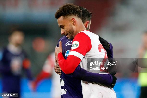 Ismail Azzaoui of Heracles Almelo, Tommy St Jago of FC Utrecht na afloop van de Nederlandse Eredivisie-wedstrijd tussen FC Utrecht en Heracles Almelo...