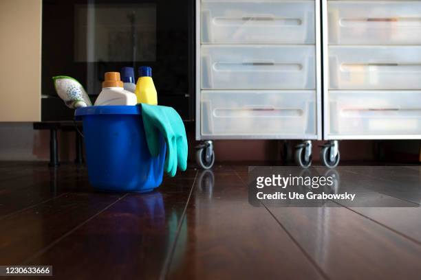 Bonn, Germany In this photo illustration is cleaning bucket with cleaning products on a floor of a kitchenon January 14, 2021 in Bonn, Germany.