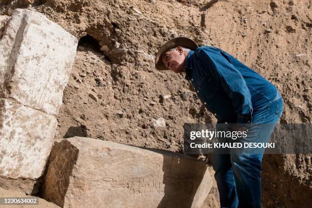 Picture taken on January 17, 2021 shows archaeologist Zahi Hawas during the announcement of a new discovery excavated by the Egyptian archaeological...