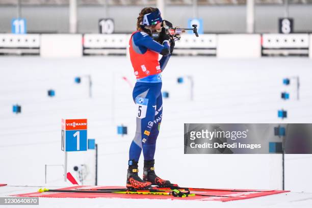 Dorothea Wierer of Italy at the shooting range during the Women 12.5 km Mass Start Competition at the BMW IBU World Cup Biathlon Oberhof on January...