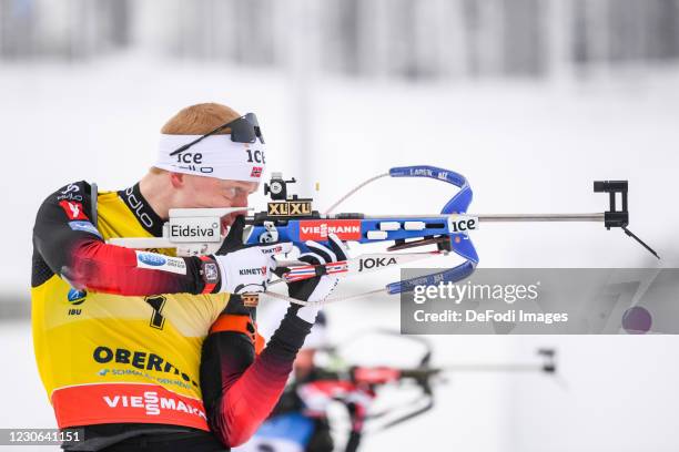 Johannes Thingnes Boe of Norway at the shooting range during the Men 15 km Mass Start Competition at the BMW IBU World Cup Biathlon Oberhof on...