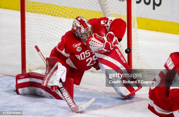 Drew Commesso of the Boston University Terriers makes a save during NCAA men's hockey against the Massachusetts Minutemen at the Mullins Center on...