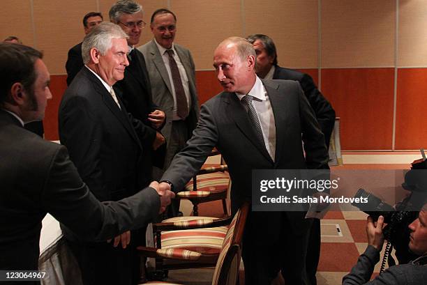 Russian President, Vladimir Putin and Rex Tillerson , Chairman and CEO of Exxon Mobil during a signing ceremony for an arctic oil exploration deal...