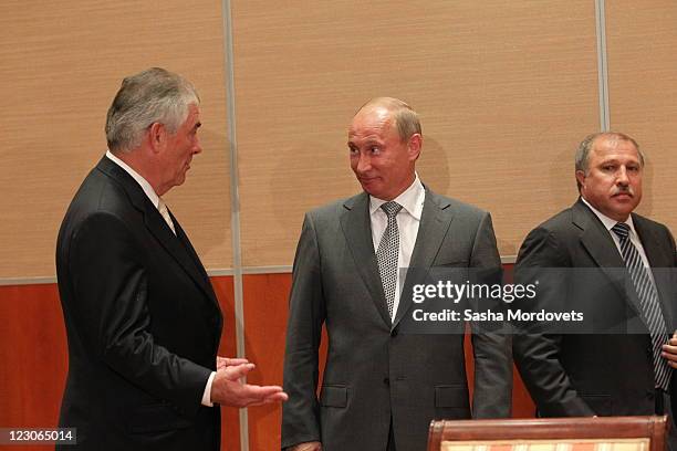 Russian President, Vladimir Putin , Rosneft President, Eduard Hudainatov and Rex Tillerson , Chairman and CEO of Exxon Mobil during a signing...