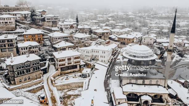 View of historic buildings in Safaranbolu, district of Karabuk Province in the Black Sea region of Turkey on January 18, 2021. Safranbolu was added...