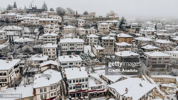 View of historic buildings in Safaranbolu, district of Karabuk Province in the Black Sea region of Turkey on January 18, 2021. Safranbolu was added...