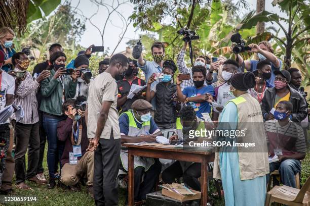 Bobi Wine, the musician and presidential candidate whose real name is Robert Kyagulanyi, votes in Magere, on the outskirts of Kampala during the...