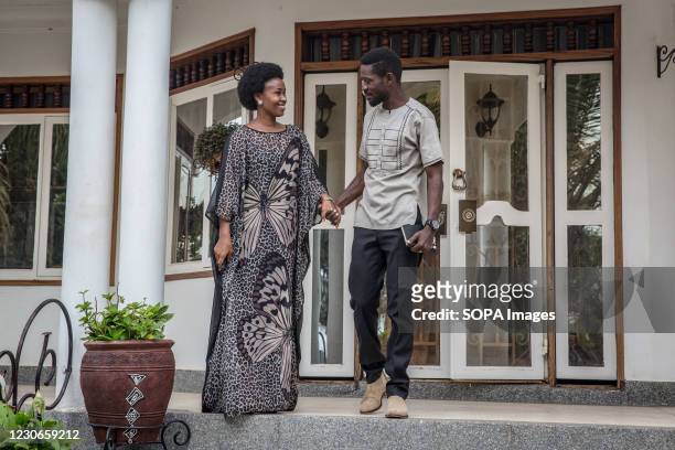 Bobi Wine, the musician and presidential candidate whose real name is Robert Kyagulanyi, and his wife Barbara Itungo are pictured outside their home...