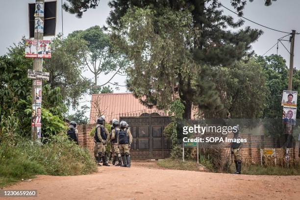 Police officers block anyone from accessing 'Freedom Drive', where the opposition leader Bobi Wine whose real name is Robert Kyagulanyi lives on the...