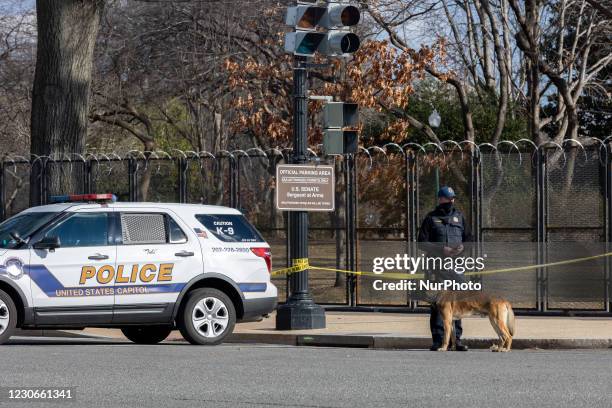 Police Officer stands watch near the US Capitol building ahead Inauguration Day in Washington, D.C. January 18, 2021