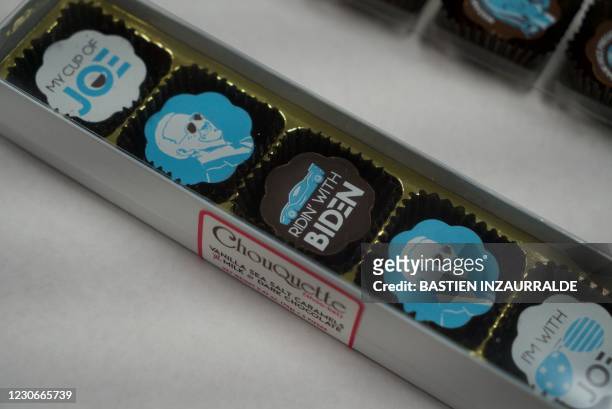 Box of Joe Biden-themed chocolates sits on a table at the office of Chouquette Chocolates in Gaithersburg, Maryland, on January 18, 2021. -...
