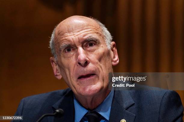 Former Director of National Intelligence Daniel Coats speaks at the confirmation hearing for DNI nominee Avril Haines before the Senate Intelligence...