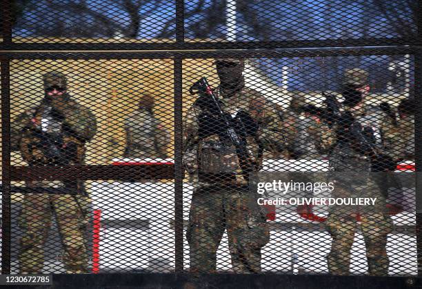 Members of the US National Guard patrol the area ahead of the 59th inaugural ceremony for President-elect Joe Biden and Vice President-elect Kamala...