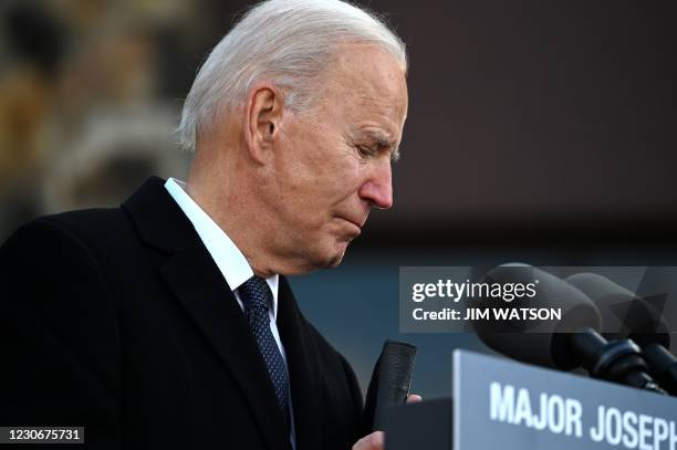 President-Elect Joe Biden is tearful tear as he speaks at Major Joseph R. "Beau" Biden III National Guard /Reserve Center in New Castle Airport on...