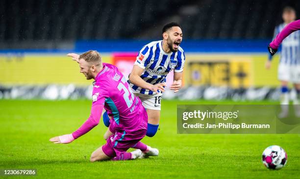 Kevin Vogt of the TSG 1899 Hoffenheim and Matheus Cunha of Hertha BSC during the Bundesliga match between Hertha BSC and TSG Hoffenheim at...