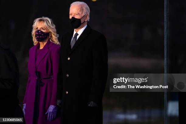 Washington, DC January 19, 2021: President- elect Joe Biden and Dr. Jill Biden stop at the COVID-19 memorial located at the reflecting pool of the...